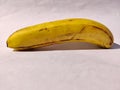 One big size yellow banana in inverted