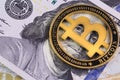 One bitcoin with dollars Royalty Free Stock Photo