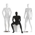 One black, faceless mannequin guy sits on a white box and two white mannequin guys stand on each side. 3D