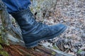 One black high army leather boot on a foot Royalty Free Stock Photo