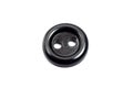 One black plastic button, isolate on white background Royalty Free Stock Photo