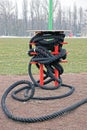 One black sports rope with an red iron coil on the edge Royalty Free Stock Photo