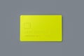 One blank credit card yellow color on gray background
