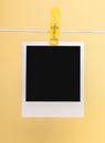 One blank photo cards isolated on yellow background Royalty Free Stock Photo