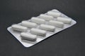 One blister whith oval tablets medicines, space for text. Royalty Free Stock Photo