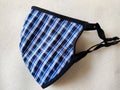 One blue color checked cloth face mask