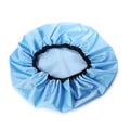 One blue shower cap isolated on white Royalty Free Stock Photo