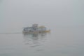 One Boat on beautfiul Xihu lakeWest Lake one of destination in china with foggy or mist Royalty Free Stock Photo