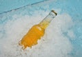 One bottle of cold lager beer on crushed ice Royalty Free Stock Photo