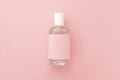 one bottle of perfume against the pink Royalty Free Stock Photo