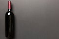 One Bottle of red wine on colored table. Flat lay, top view wth copy space Royalty Free Stock Photo