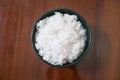 One bowl of white rice on a brown wooden table Royalty Free Stock Photo