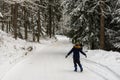 One boy happy runs in the forest walk in the fresh winter air