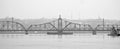 Steel bridge over Mississippi River in black and white