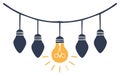 One bright light bulb stands out among many dark bulbs on a string symbolizing creativity and innovation Royalty Free Stock Photo