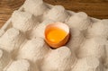 One Broken Chicken Egg, Broken Eggs in Carton Pack, Fresh Brown Hen Eggs Container Royalty Free Stock Photo