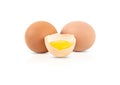 One broken egg and two whole eggs isolated on a white background Royalty Free Stock Photo