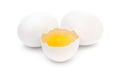 One broken egg with two whole eggs on white background Royalty Free Stock Photo