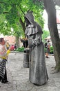 One of the bronze `Three Monks` at the Danish King Garden in Old Town of Tallinn, Estonia