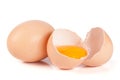 One brown egg and broken egg isolated on white background Royalty Free Stock Photo