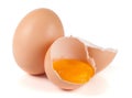 One brown egg and broken egg isolated on white background Royalty Free Stock Photo