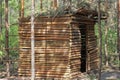 one brown wooden empty open gazebo made of pine logs