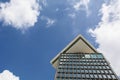 One building under the blue sky with reflections in the windows Royalty Free Stock Photo