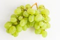 One bunch of ripe organic white grapes isolated on white background, top view Royalty Free Stock Photo