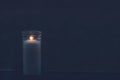 One burning candle funeral concept with copy space