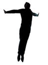 One business man jumping flying silhouette Royalty Free Stock Photo