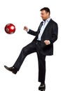 One business man playing juggling soccer ball