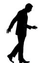 One business man walking looking down silhouette Royalty Free Stock Photo