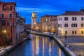 One of the canals in Venice and the Arsenal Tower in the distance. Italy, blue hour