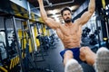 Caucasian man exercising with suspension training trx Royalty Free Stock Photo