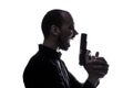 One caucasian man holding gun portrait silhouette Royalty Free Stock Photo