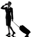 Stewardess cabin crew woman on the phone isolated silhouette