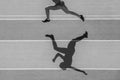 One caucasian woman runner jogger running in silhouette  on stadium background. Black and white color Royalty Free Stock Photo