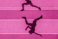 One caucasian woman runner jogger running in silhouette  on stadium background. Pink color filter Royalty Free Stock Photo