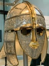 The Sutton Hoo helmet is ornately decorated Anglo-Saxon helmet found during a 1939 excavation of the Sutton Hoo ship burial. Royalty Free Stock Photo