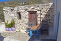 One of the charms of Mykonos, the Greek island of Cyclades, are the small terraces with their colorful tables and chairs on the gr