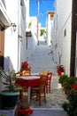 One of the charms of Mykonos, the Greek island of Cyclades, are the small terraces with their colorful tables and chairs