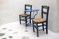 One of the charms of Mykonos, the Greek island of Cyclades, are the small terraces with their colorful tables and chairs