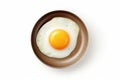 One Chicken Egg in a Small Pan Isolated, Lightly Fried Egg on White Background Top View, Flat Lay Royalty Free Stock Photo