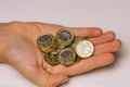 Hand of a child with British pound coins Royalty Free Stock Photo