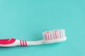 One clean toothbrush on a blue background. Copy space Royalty Free Stock Photo