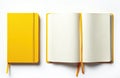 One closed yellow notebook, one open notebook with blank pages, ready for notes, ideas. These objects are placed side by side on Royalty Free Stock Photo