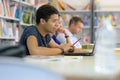 one college student study in library with laptop Royalty Free Stock Photo