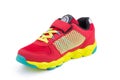 One colorful bright red and yellow children laced snickers shoe boot isolated