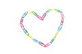 One colorful heart from paperclips on the white Royalty Free Stock Photo