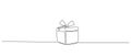 One Continuous line drawing of Christmas Gift box with ribbon and bow. Festive present and Wrapped surprise package in Royalty Free Stock Photo